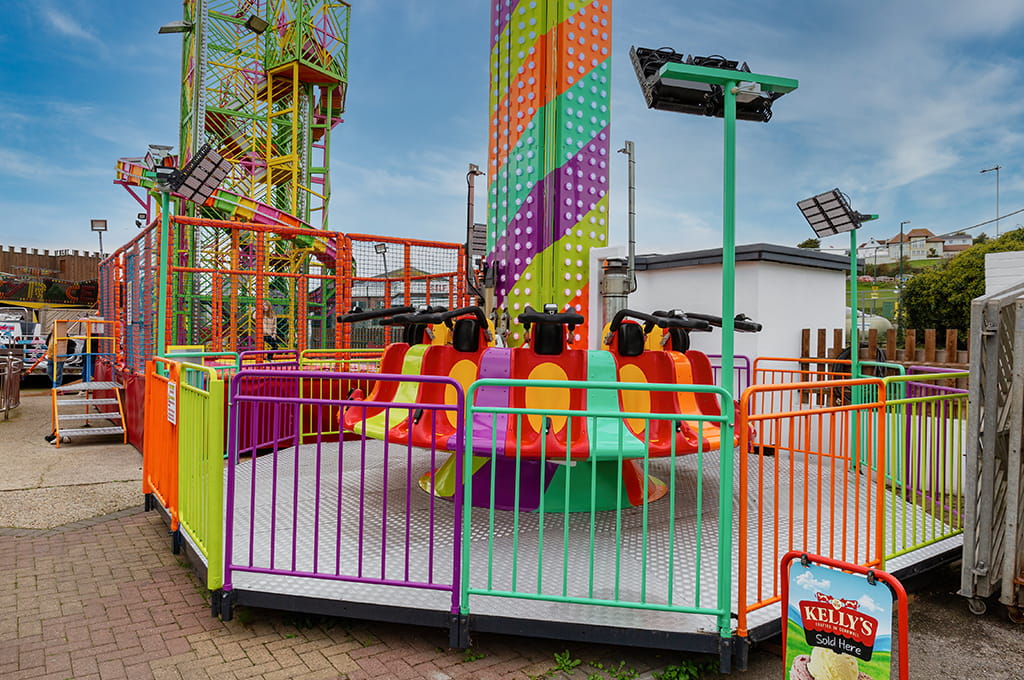 A colorful ride at an amusement park.